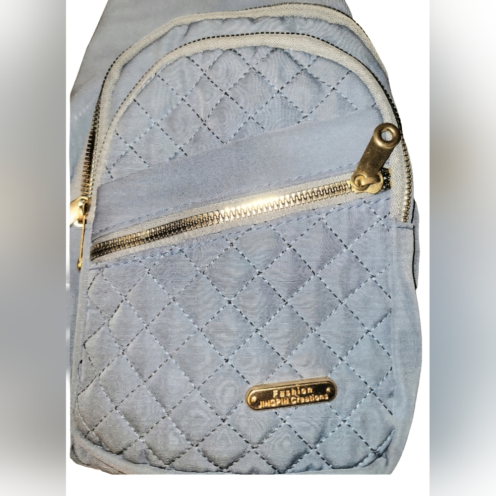Quilted Lt Blue Crossbody Sling Bag With Headphone Hole & Multiple Pockets